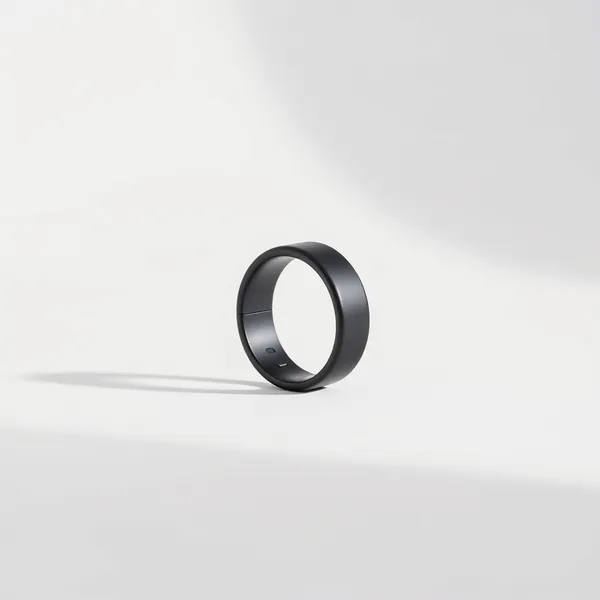 Illustrative image: a black smart ring sleep tracker