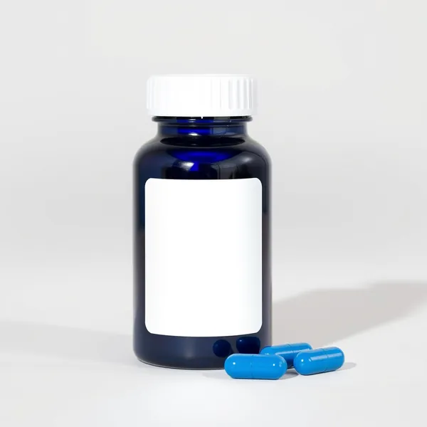 Illustrative image: a dark blue bottle of magnesium capsules